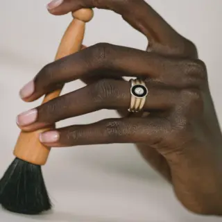 Bold signet ring by J.Hannah Jewelry with black onyx inlay and recycled diamond, part of the Chess capsule collection.