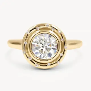 Audry Rose Spotlight Ring in 18K rose gold with a center round diamond and delicate diamond accents