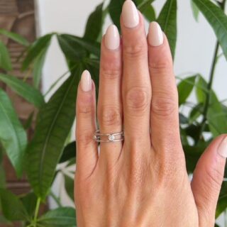 Minimalist 18K yellow gold band featuring five bezel-set diamonds by Elsa Peretti for Tiffany & Co