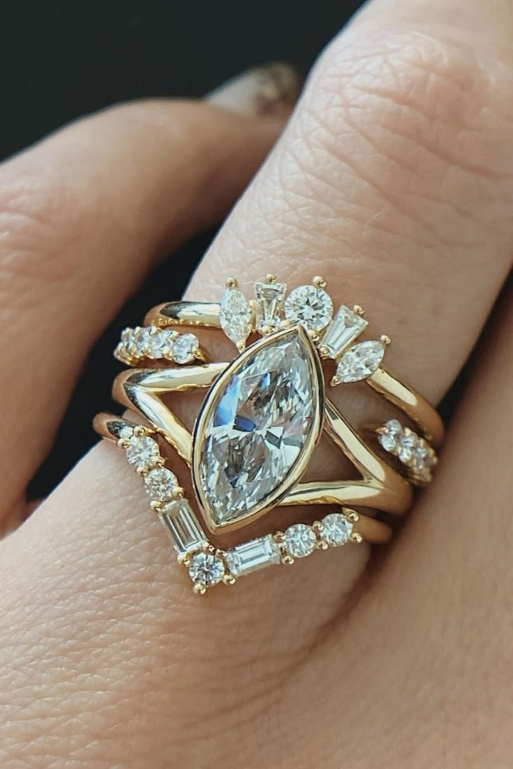 Modern bezel-set marquise diamond split‑shank engagement ring – Colette in yellow gold
