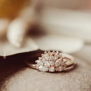 The Luna Band engagement ring in 14k yellow gold, featuring a 0.60 carat fan-shaped arrangement of marquise and round diamonds in a modern, low-profile setting