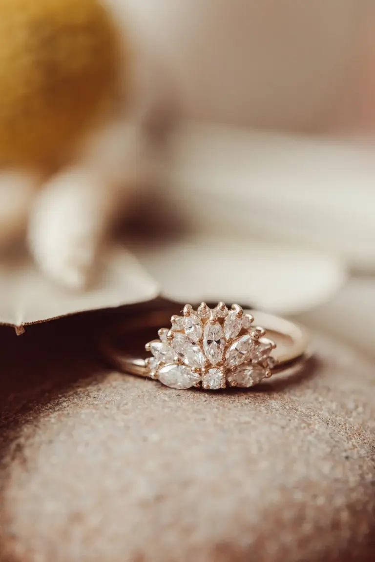 The Luna Band engagement ring in 14k yellow gold, featuring a 0.60 carat fan-shaped arrangement of marquise and round diamonds in a modern, low-profile setting