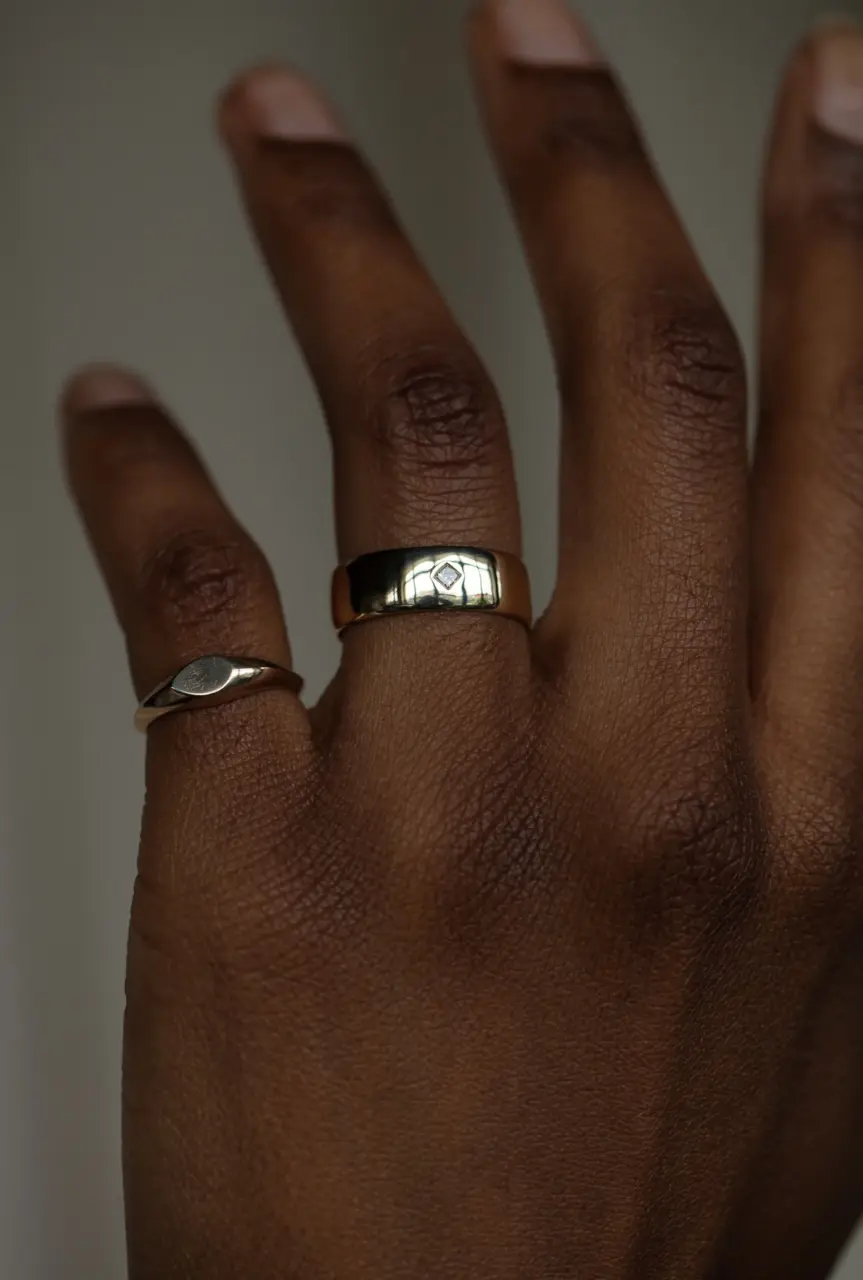 Ethically sourced Fairmined gold ring with reclaimed princess‑cut diamond, WWAKE Row Ring No. 4 in 14 k yellow gold, wide band design.