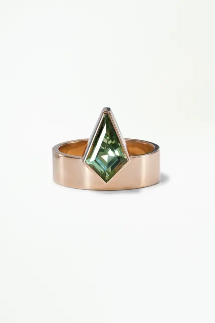 Close-up of WWAKE’s Monolith ring showcasing a 1.0ct kite-cut sapphire with a sleek 5.4mm wide band, handmade in New York.