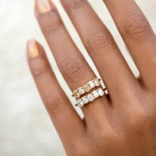 Lash Linear Diamond Ring by Bario Neal with five diamonds set in alternating bezel and prong lash settings on a fine gold band