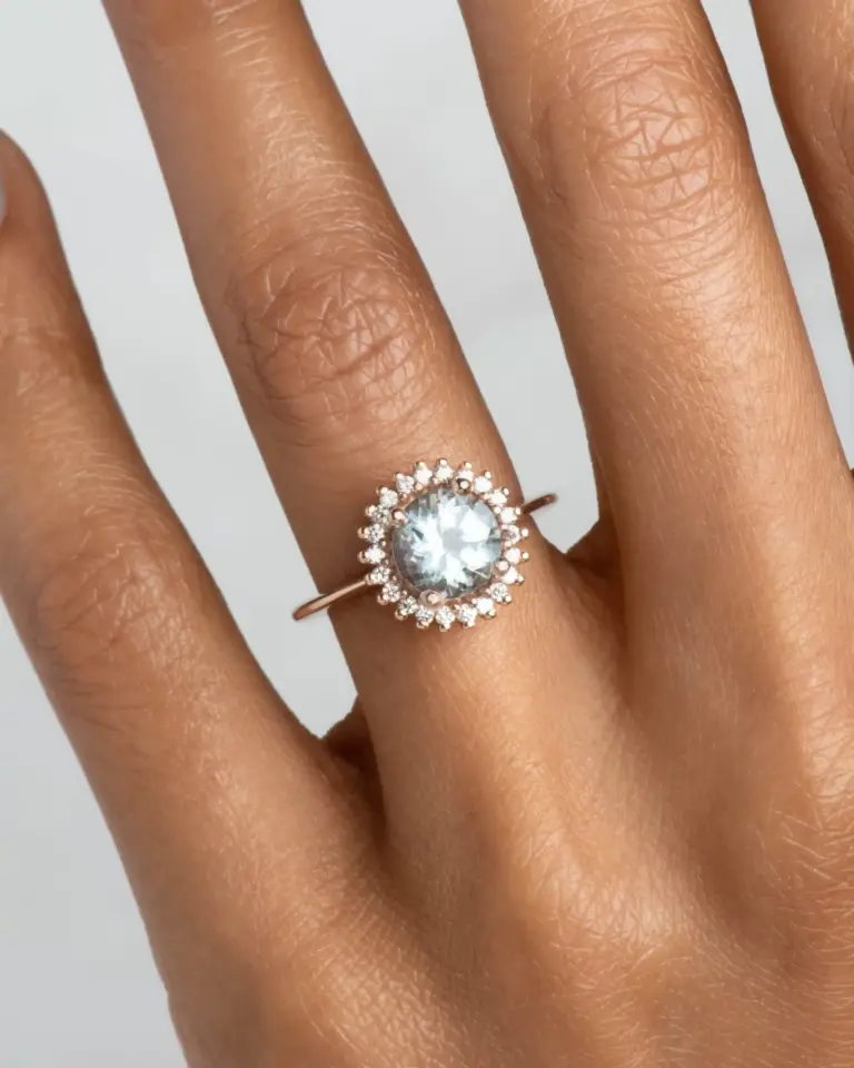Ethically made aquamarine and diamond halo ring – modern celestial-inspired design in solid gold