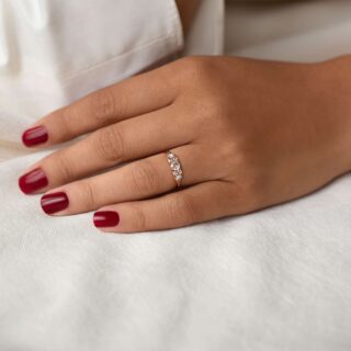 Overture Ring in 14k gold, adorned with seven rose cut diamonds, reflecting Melanie Casey's commitment to vintage aesthetics