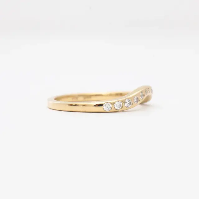 Detailed view of the Grey Diamond Lana Band's underside, showcasing the craftsmanship and solid gold construction.