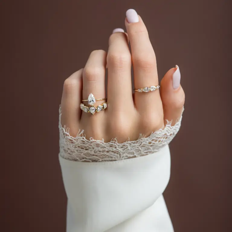 Whimsical diamond garland ring with alternating marquise and round stones in solid gold band