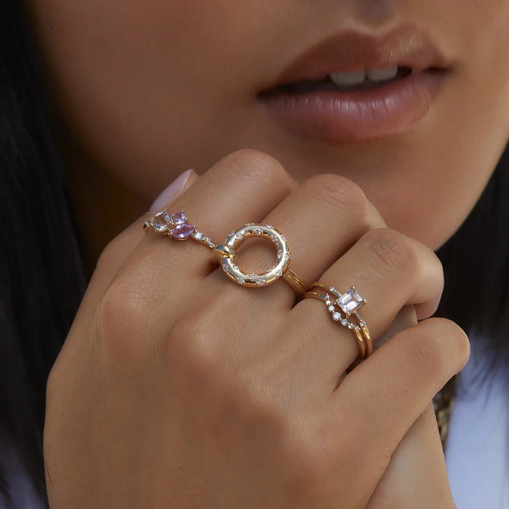 Top view of the Aria Ring in 14k yellow gold featuring a circular array of sparkling brilliant-cut white diamonds.