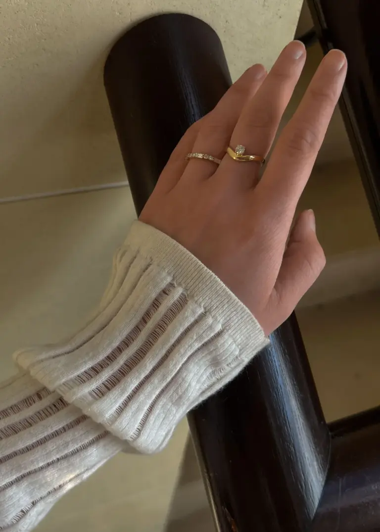 14k solid yellow gold Katherine ring with a 0.26 carat round lab diamond, tapered curved band design by Kinn Studio