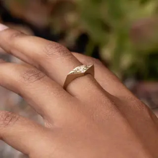 Audry Rose Eye of Ailuros Ring: 14k yellow gold with three tapered white diamonds and delicate whisker engravings, inspired by the Egyptian goddess Bastet.