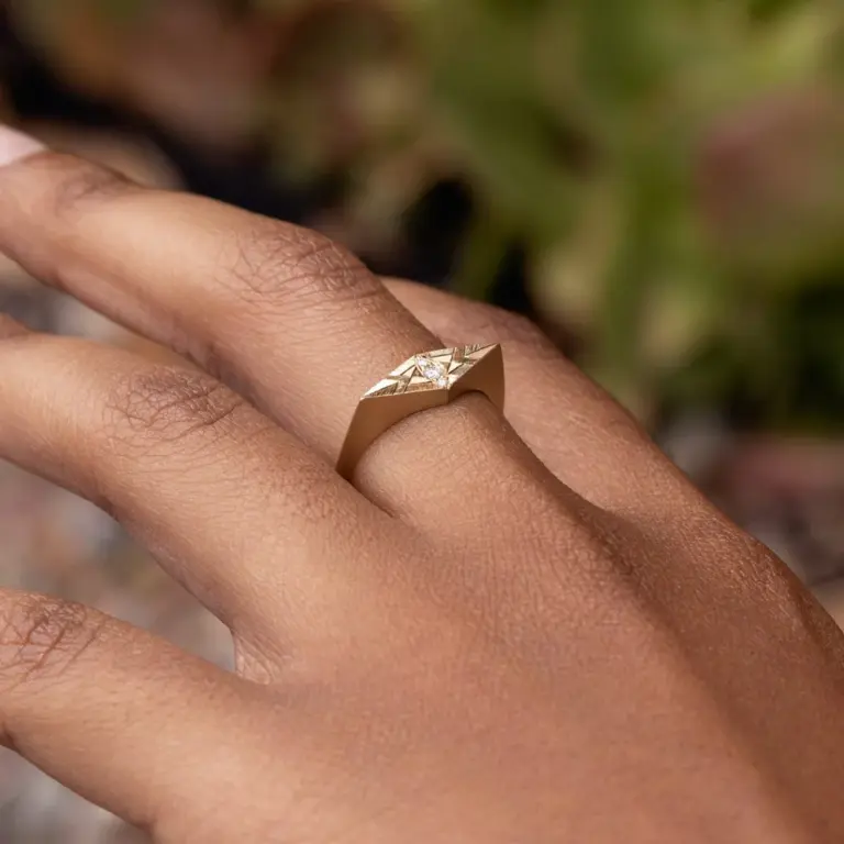 Audry Rose Eye of Ailuros Ring: 14k yellow gold with three tapered white diamonds and delicate whisker engravings, inspired by the Egyptian goddess Bastet.