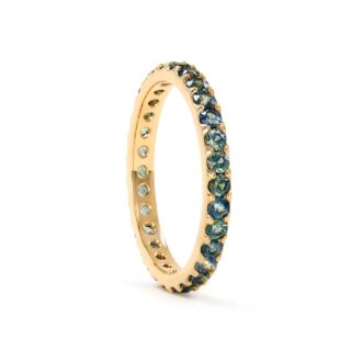 Green Sapphire Eternity Ring by Elliot Gaskin featuring ethically sourced green sapphires set in 100% recycled 14k gold