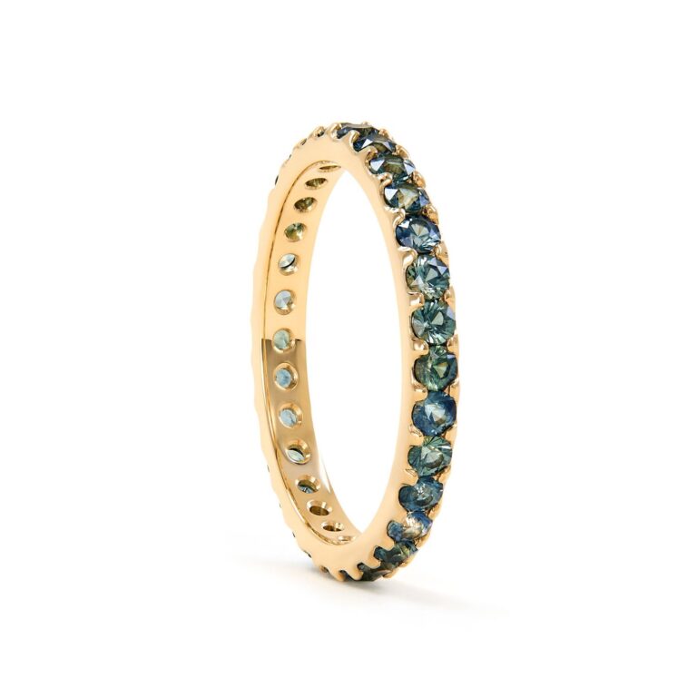 Green Sapphire Eternity Ring by Elliot Gaskin featuring ethically sourced green sapphires set in 100% recycled 14k gold