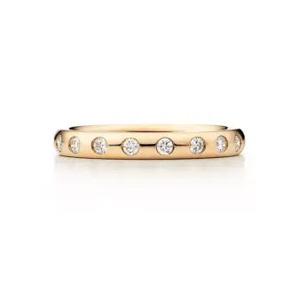 Elsa Peretti® Stacking Band Ring in 18k yellow gold with a sleek, rounded profile - perfect for layering