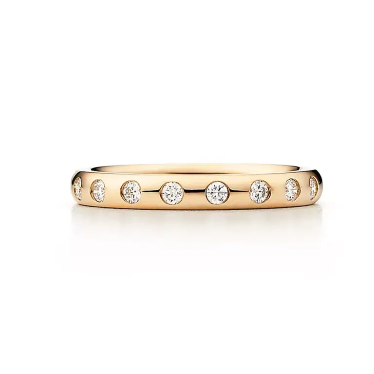 Elsa Peretti® Stacking Band Ring in 18k yellow gold with a sleek, rounded profile - perfect for layering