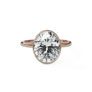 Penumbra Bezel Engagement Ring by GoodStone: 18k white gold band featuring a 4.51ct lab-grown oval cut diamond, offering a modern and secure setting