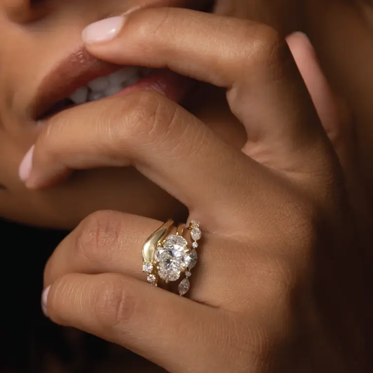 Side profile of the Anya Ring, highlighting the delicate 14k gold band and diamond arrangement