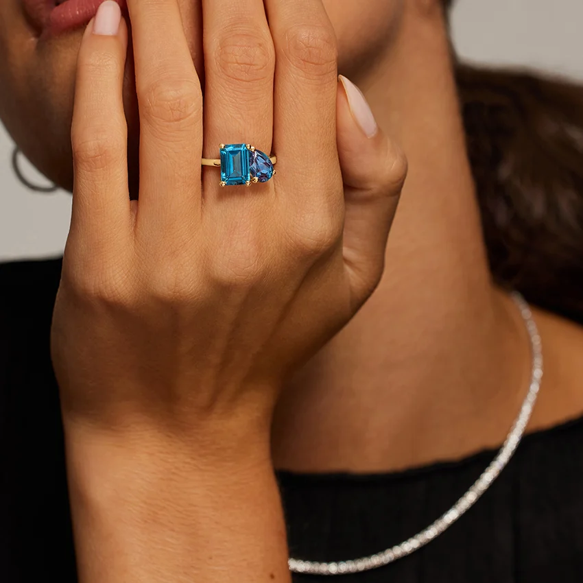 Brilliant Earth Toi et Moi ring with emerald-cut London Blue topaz and pear-shaped lab alexandrite, crafted in 18K white gold