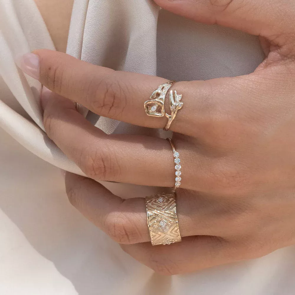 Side profile of the Grecian Diamond Cigar Band highlighting its 12mm wide band and the precision of the diamond settings.