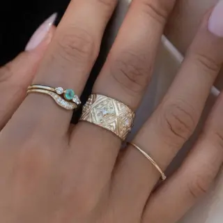 Model wearing the Grecian Diamond Cigar Band, emphasizing its bold and architectural design.