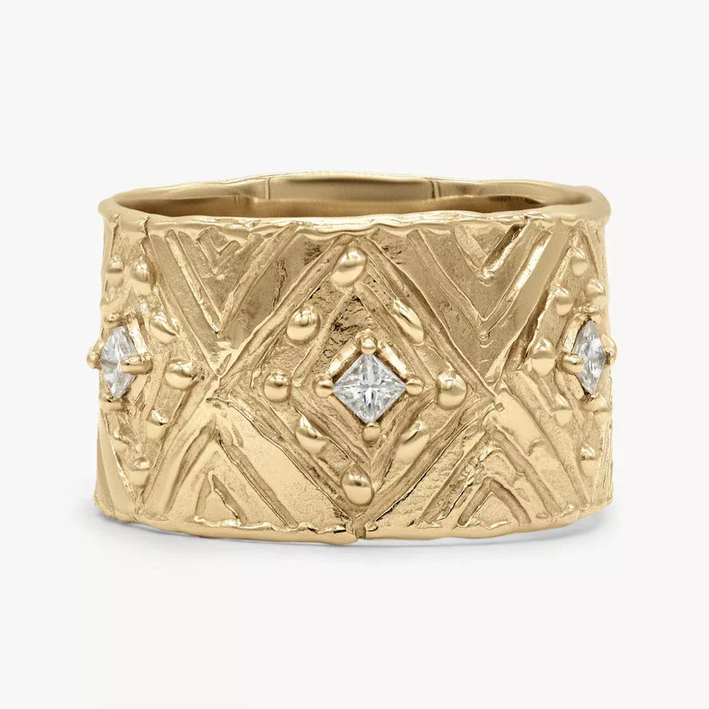 Close-up of the Grecian Diamond Cigar Band showcasing six 2mm princess-cut white diamonds set in a 14k yellow gold band.
