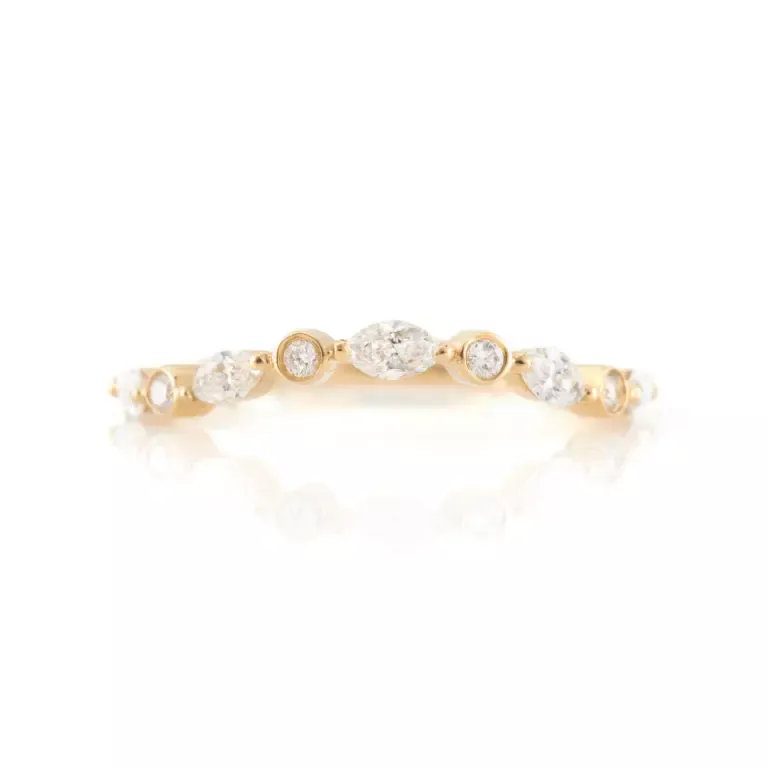 Close-up of the Diamond Crown Ring showcasing alternating marquise and brilliant-cut diamonds set in an 18K yellow gold band.