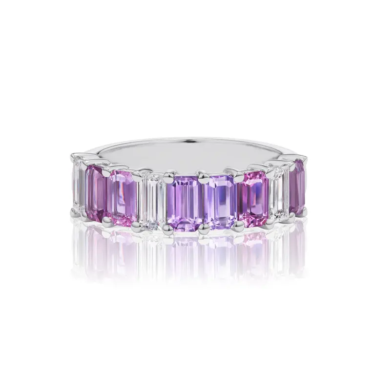 Serpentine Jewels Emerald Cut Half Eternity Band: 18K white gold ring featuring .63 tcw emerald cut diamonds and multicolored sapphires in pink, magenta, lilac, and lavender hues
