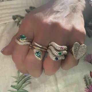 Organic wavy stacking ring In Awe by Ashleigh Bergman, 14k gold band with sparkle of conflict‑free diamonds and jewel‑tone sapphires