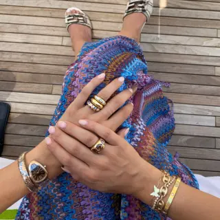 Handcrafted 7mm wide Wavey Rainbow Classic Nomad Ring by Claudia Mae, featuring a vibrant mix of sapphires, rubies, and tsavorite garnets