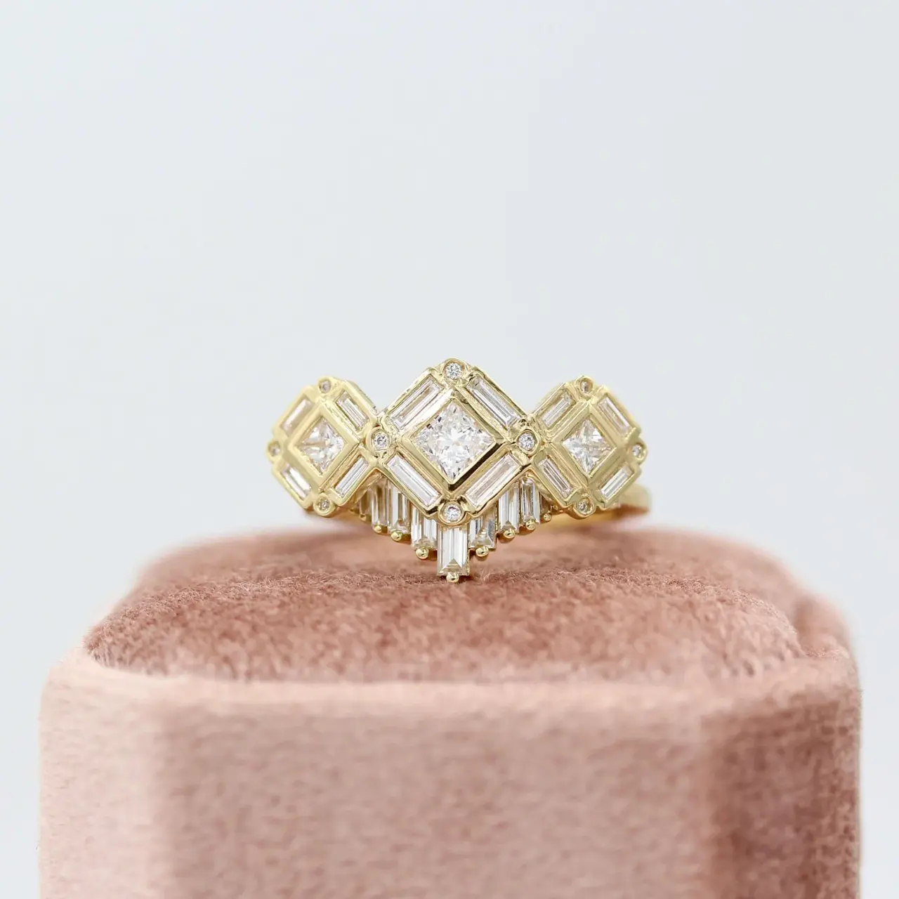 Side profile of The Darby Ring illustrating floating diamond silhouette and halo details