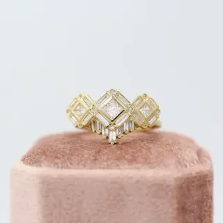 Side profile of The Darby Ring illustrating floating diamond silhouette and halo details