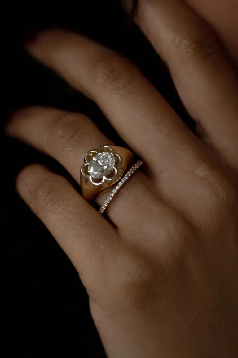 Customizable Flora East-West Oval Ring with a 1.75-carat oval center stone set horizontally in solid 14k gold.