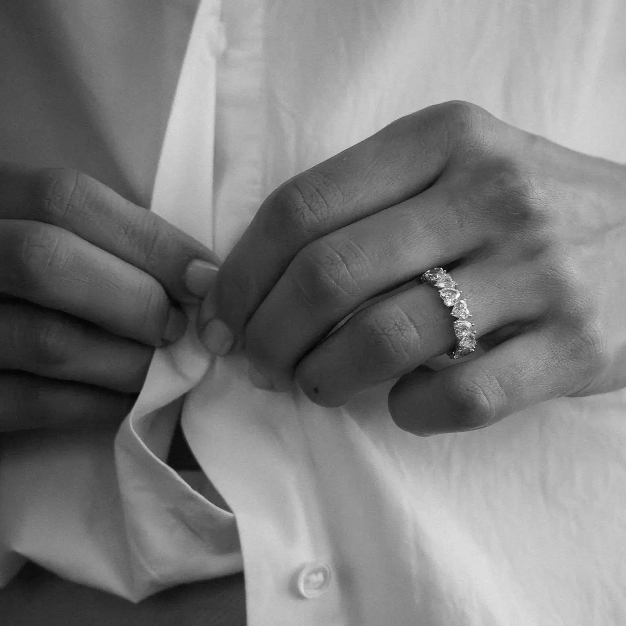 Kinn sturio created heart diamond eternity band. this ring would fit therapist or laywer profession.