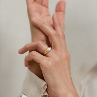 Kinn Studio Eloise ring in 14K solid gold, marquise diamond flush‑burnish set in signet style