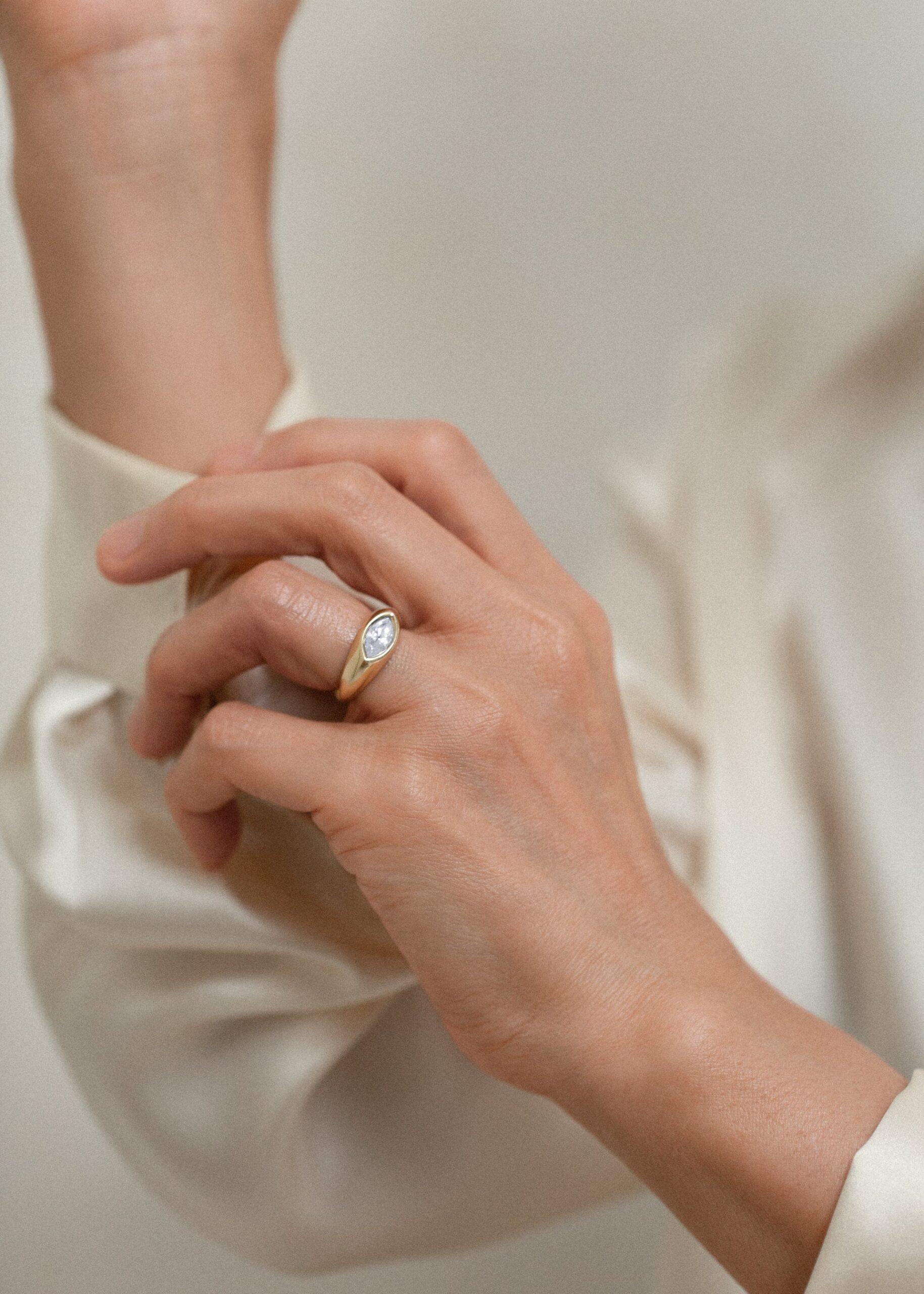 The Eloise by Kinn: modern signet ring with marquise diamond and tapered 14K gold band