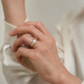 The Eloise by Kinn: modern signet ring with marquise diamond and tapered 14K gold band