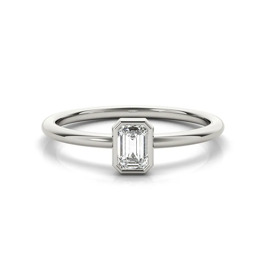 Do Amore Lakshmi 14 k white gold stackable ring with 0.33 ct lab‑created emerald bezel‑set on a delicate rounded comfort‑fit band