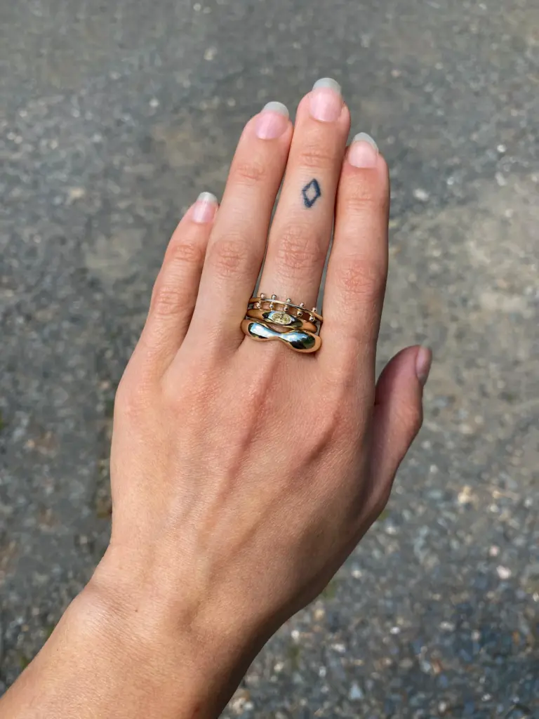 Yellow Sapphire Petite Risa Ring by M. Hisae featuring a 0.35ct oval yellow sapphire in a tapered 14k recycled gold band.