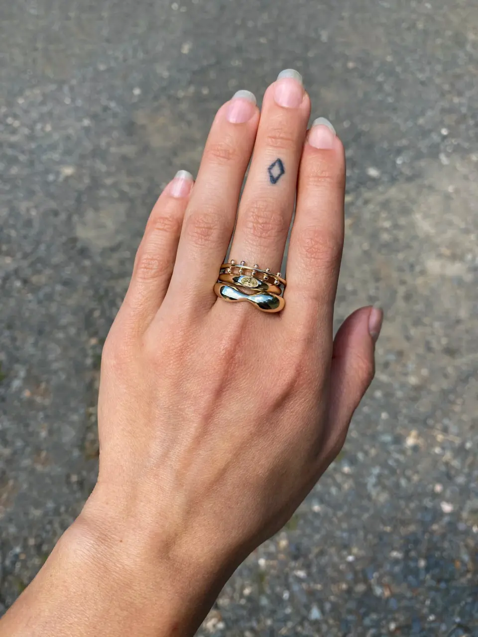 Yellow Sapphire Petite Risa Ring by M. Hisae featuring a 0.35ct oval yellow sapphire in a tapered 14k recycled gold band.