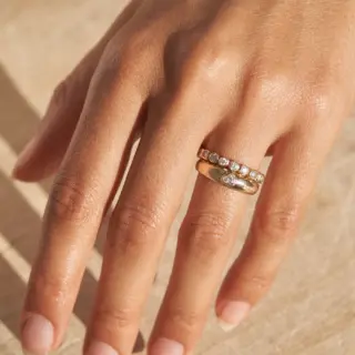 Elegant two-tone 14K gold engagement ring featuring a 3.18ct lab-grown elongated cushion cut diamond and hidden halo.