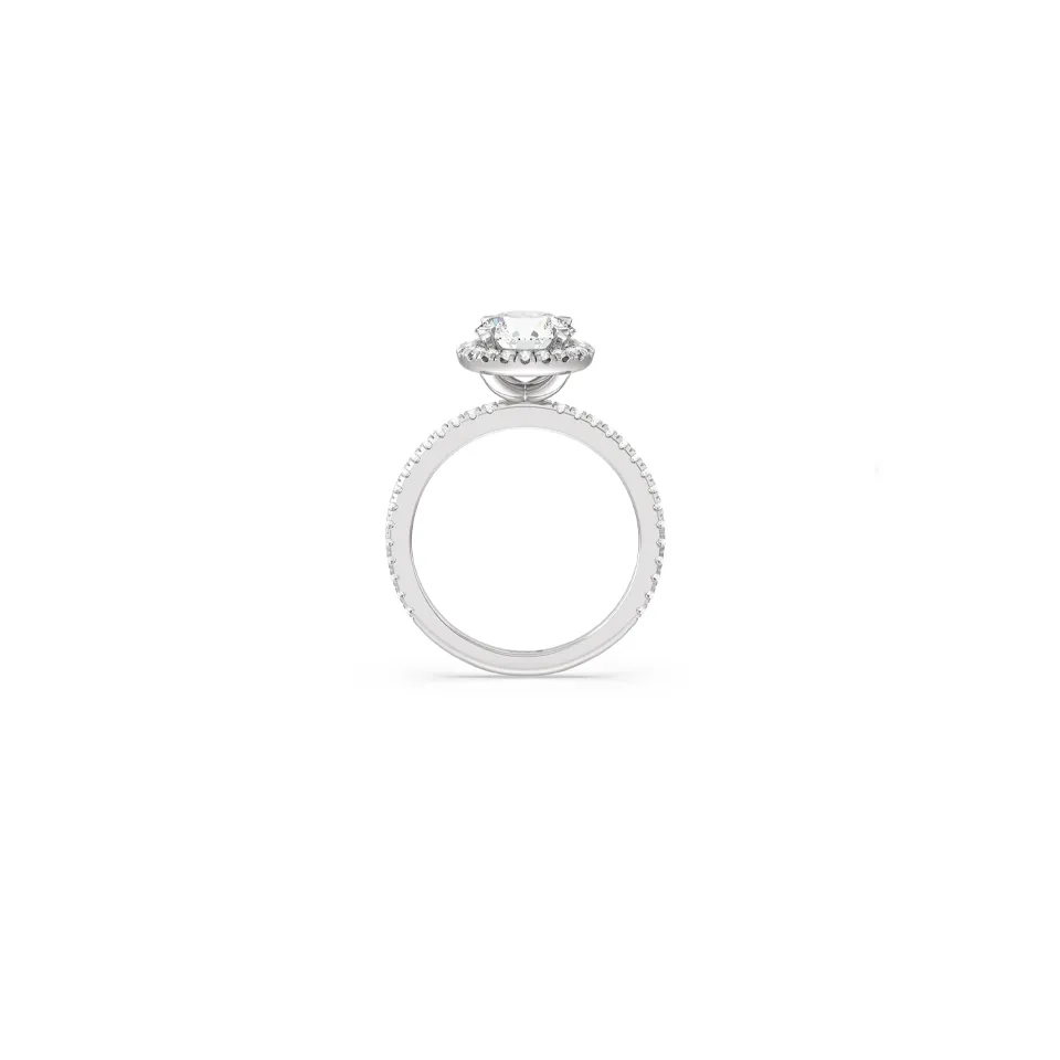 Side profile of With Clarity’s pavé halo engagement ring highlighting the slim 1.6mm band and elevated setting with sparkling accent diamonds.
