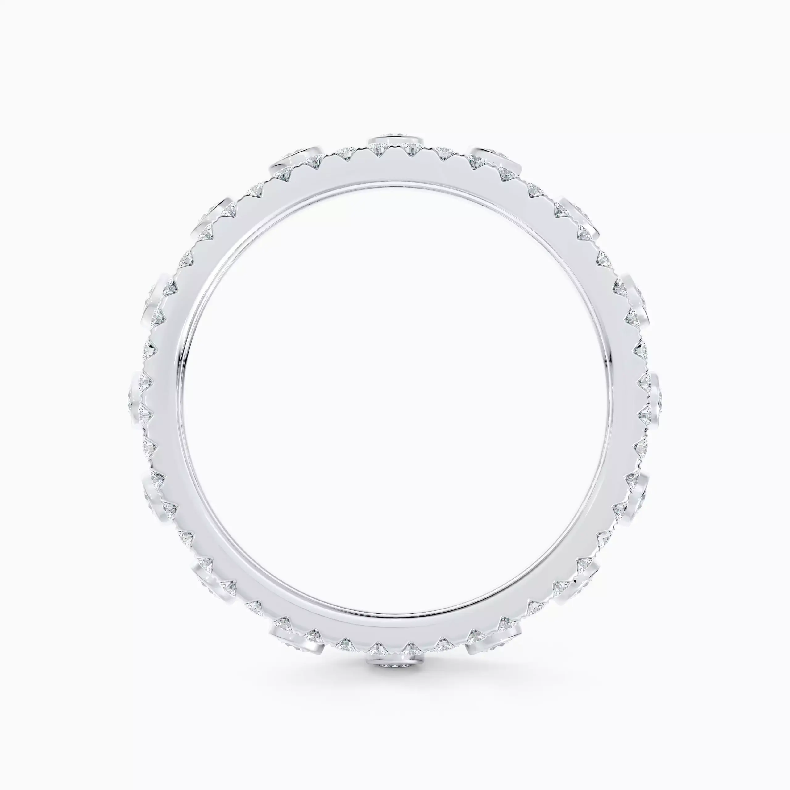Close-up of De Beers Dewdrop ring showcasing intricate pavé and bezel diamond arrangement in white gold