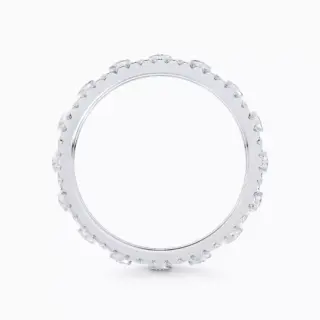 Close-up of De Beers Dewdrop ring showcasing intricate pavé and bezel diamond arrangement in white gold