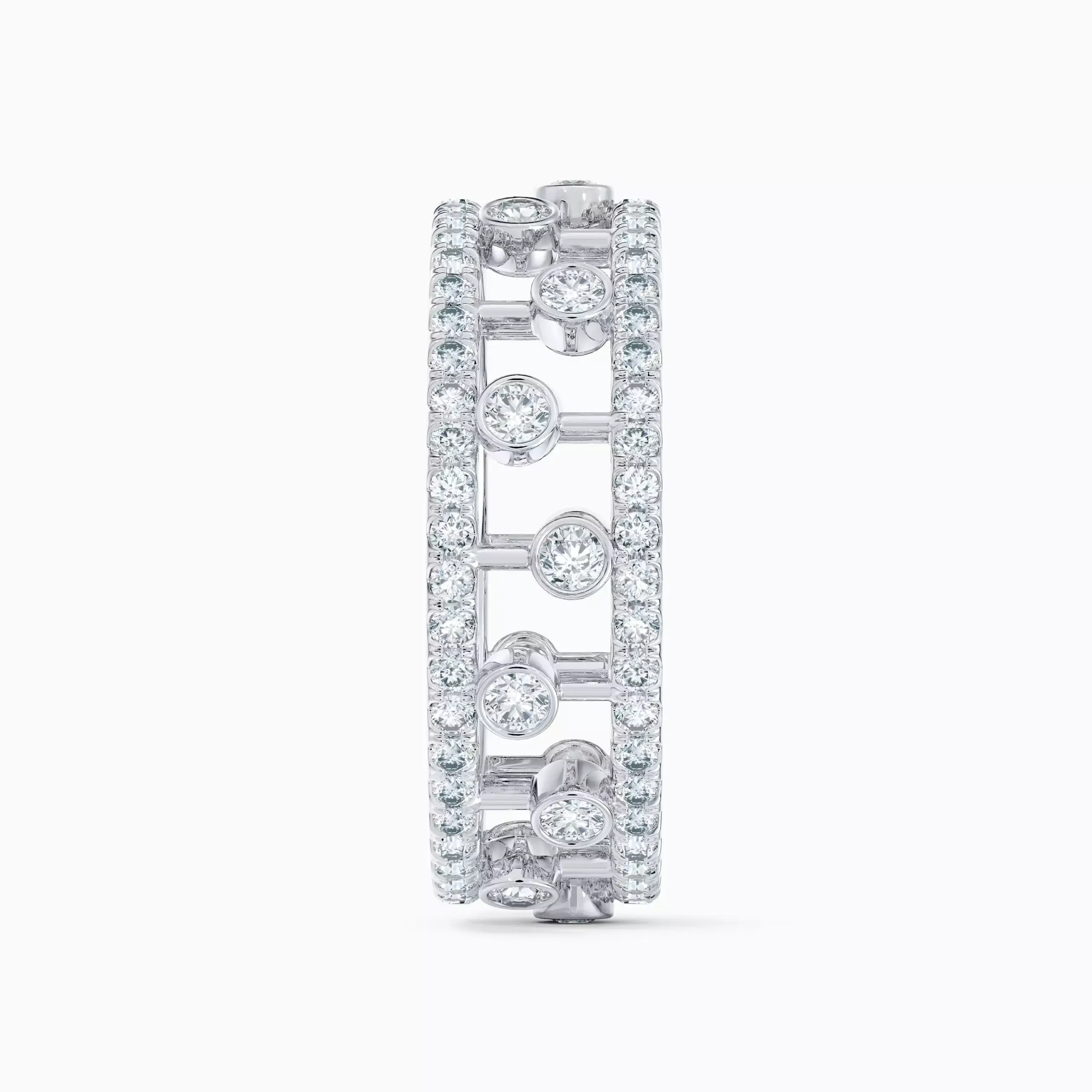 Close-up of De Beers Dewdrop ring showcasing intricate pavé and bezel diamond arrangement in white gold