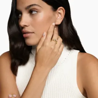 Close-up of the Petite Cable Ring, highlighting the 2.8mm diamond and the intricate twisted cable design in 18K yellow gold.