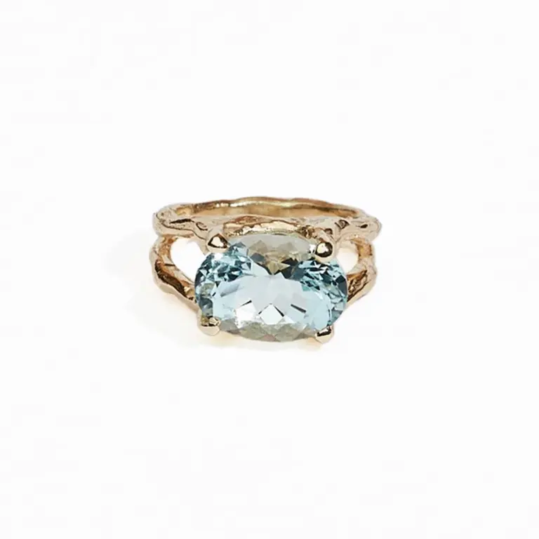 JP Aquamarine Branch Ring by Jane Pope Jewelry featuring a 4.75 ct oval aquamarine in 14kt recycled yellow gold with a textured band.