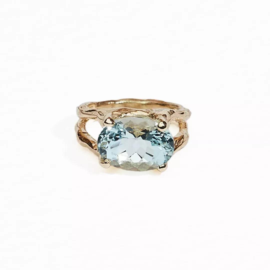 JP Aquamarine Branch Ring by Jane Pope Jewelry featuring a 4.75 ct oval aquamarine in 14kt recycled yellow gold with a textured band.