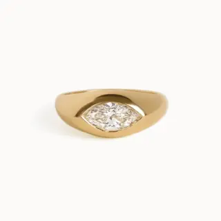 The Eloise engagement ring by Kinn Studio: 14K gold band with flush‑set marquise diamond